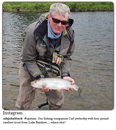 Spatsizi- Our fishing companion. Carl yesterday with four pound rainbow trout from Lake Rainbow ...where else?