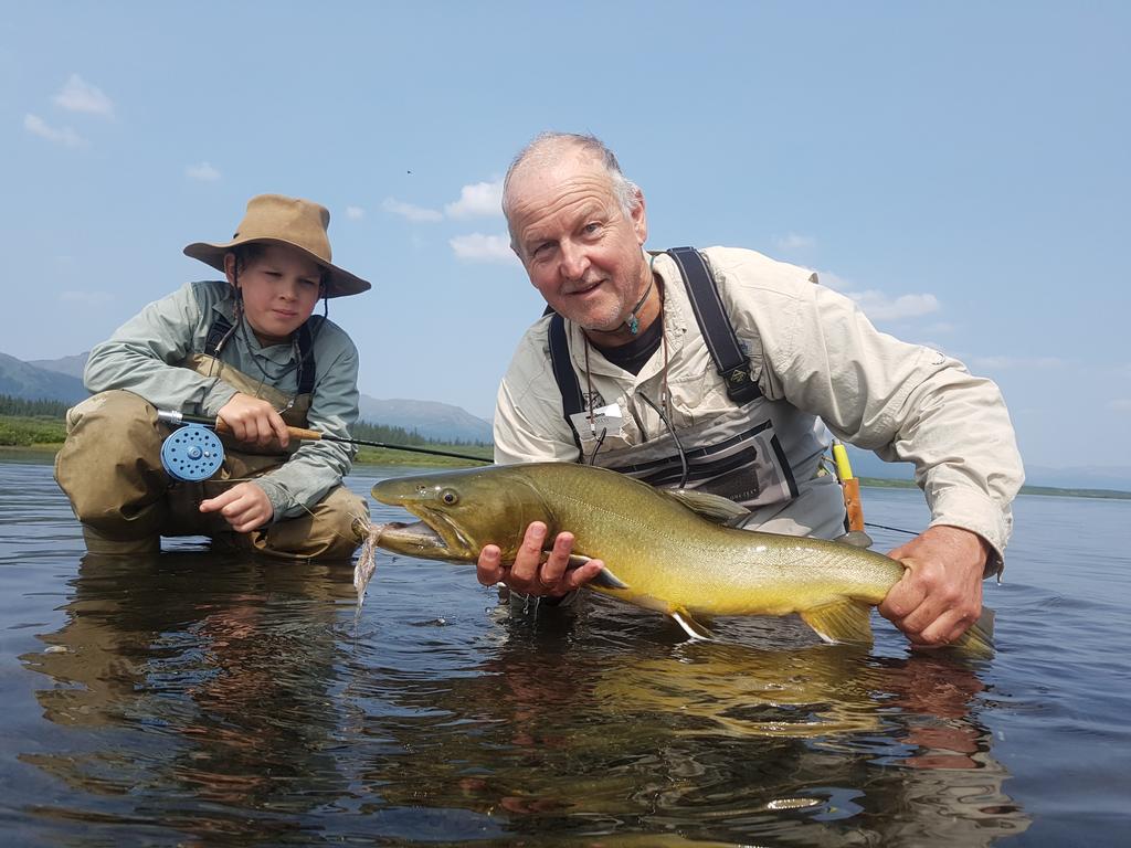 Whew! Your humble scribe today landed The Yellow One, a 14 pound, 32 inch, Bull Trout.