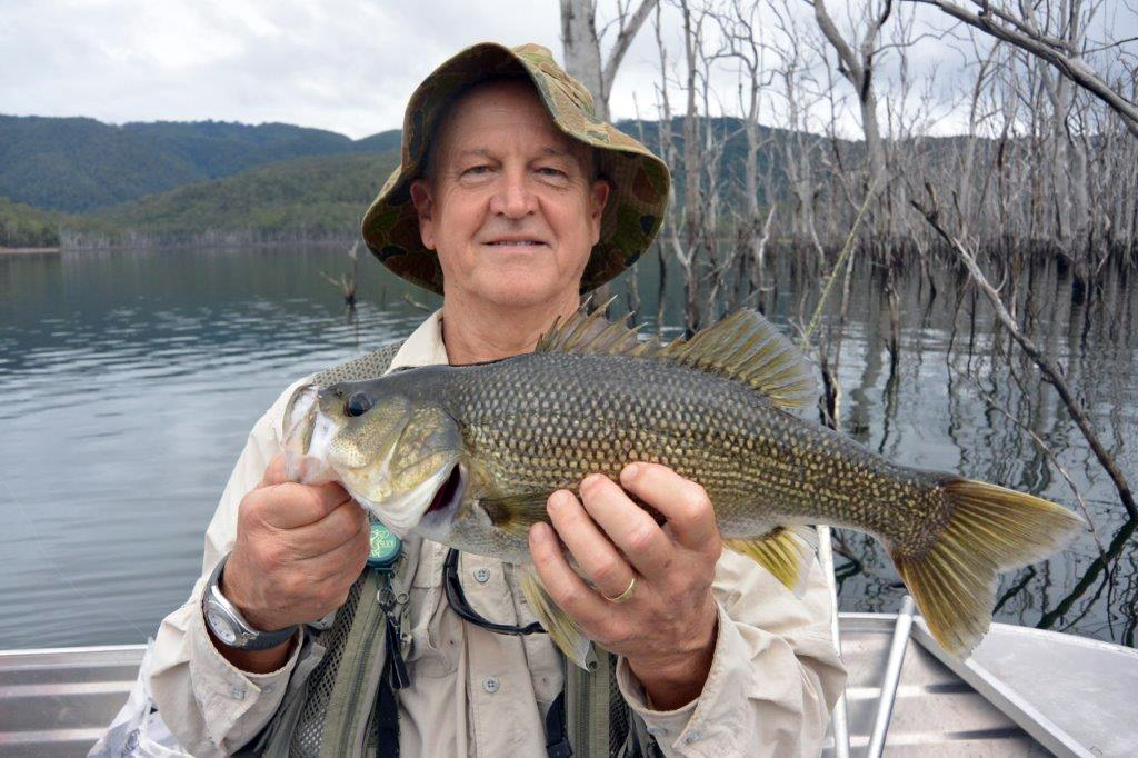 John and his catch, Family Fishing Trip to Hinze Dam, Qld